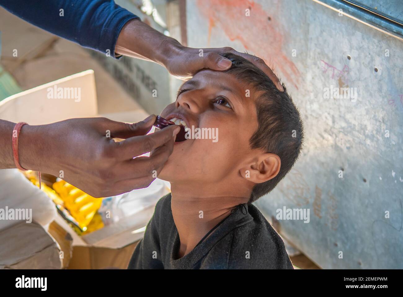 Rajasthan. India. 07-02-2018. Children receiving medical attention from a doctor at school in a village in the Rajasthan. Stock Photo