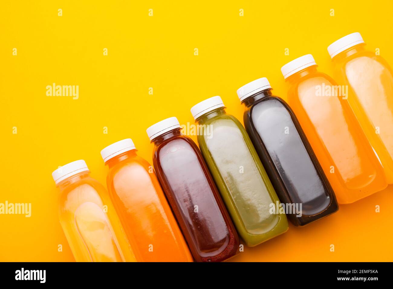 Top view photo of different detox juice bottles, antioxidant and daily