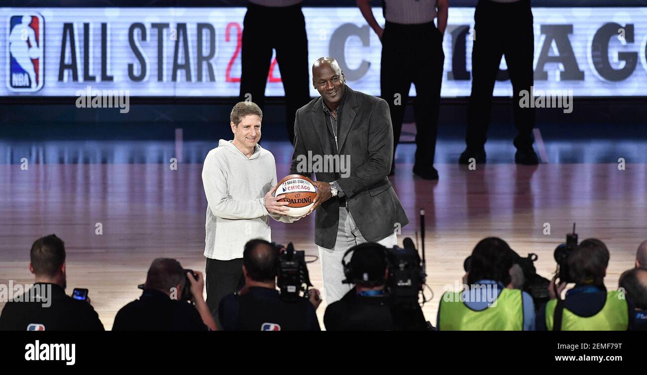 Michael Reinsdorf Jr., Chicago Bulls President/COO, accepts the ceremonial  All-Star ball from Charlotte Hornets Chairman Michael Jordan as the Bulls  will host 2020 NBA All-Star game, during a break in the 2019