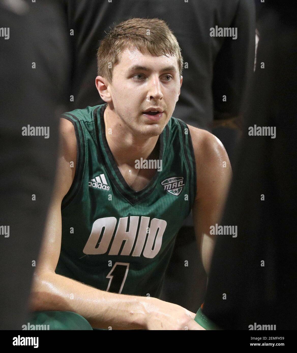 Feb 19, 2019: Ohio Bobcats forward Jason Carter (1) sits in a team huddle  during a media timeout in the first half of play in the NCAA Basketball  game between the Ohio