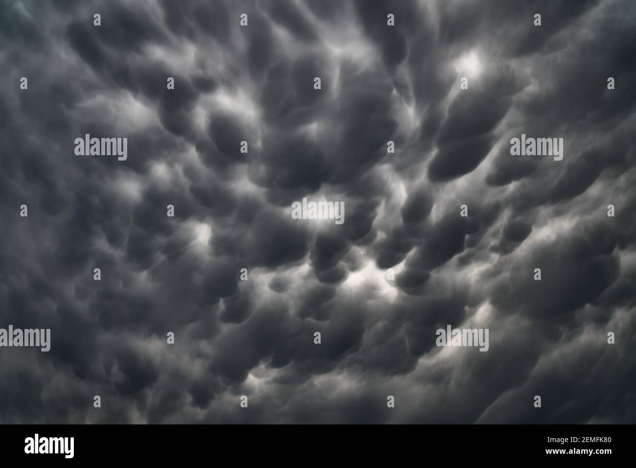 Stormy sky with dark angry clouds; color photo. Stock Photo