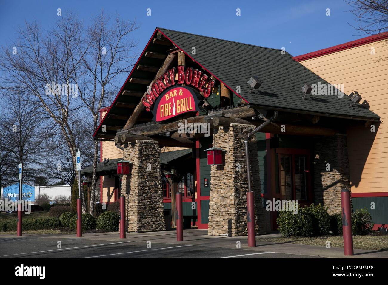 A logo sign outside of a Smokey Bones Bar and Fire Grill restaurant  location in Fredericksburg, Virginia on February 19, 2019. (Photo by  Kristoffer Tripplaar/Sipa USA Stock Photo - Alamy