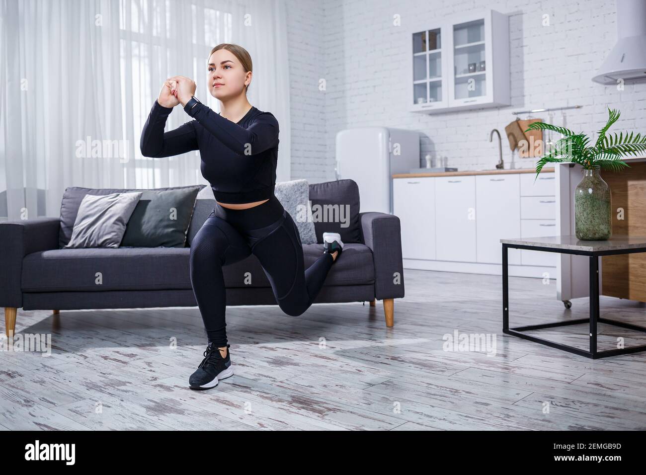 Young beautiful sports girl in leggings 