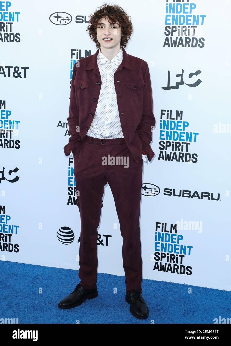 SANTA MONICA, LOS ANGELES, CA, USA - FEBRUARY 23: Actor Finn Wolfhard  wearing a Darkoh suit, Etro shirt, and Tod's shoes arrives at the 2019 Film  Independent Spirit Awards held at the