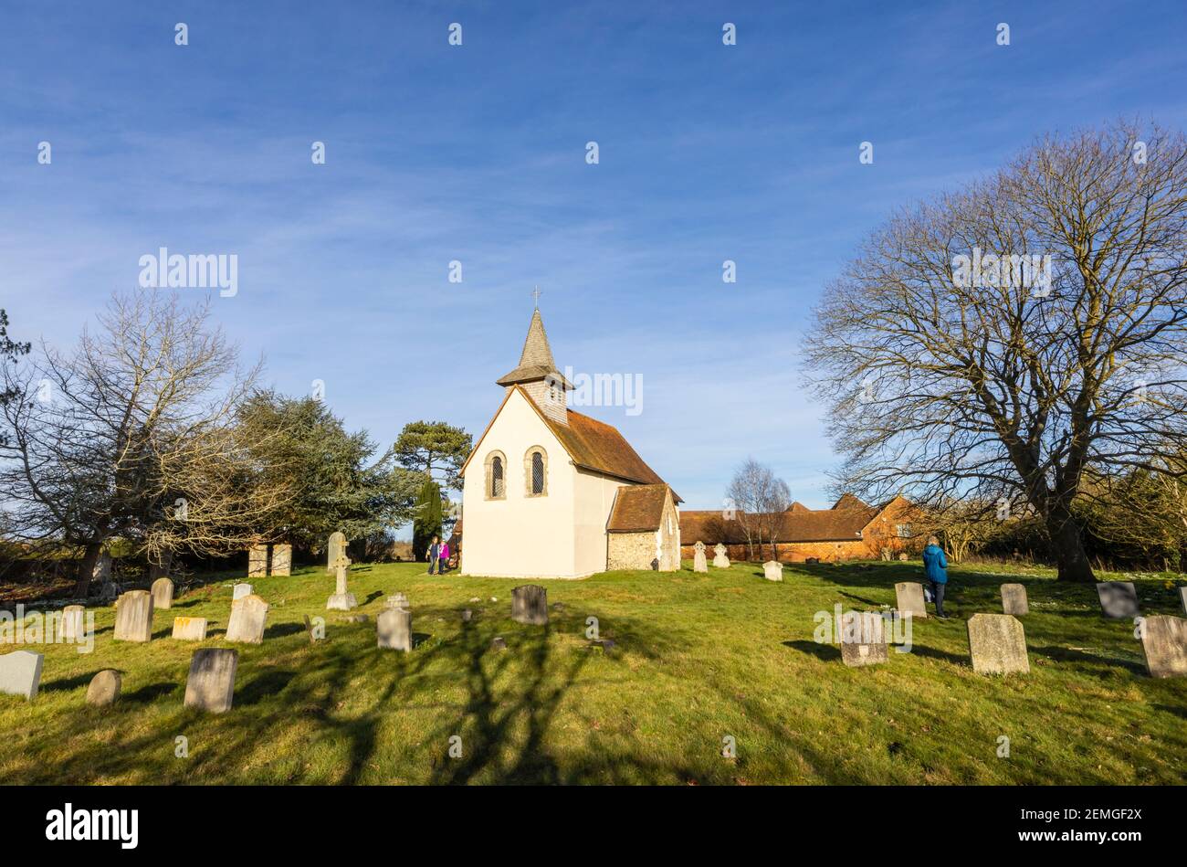 Exterior of the small, historic Wisley Church dating back to Norman