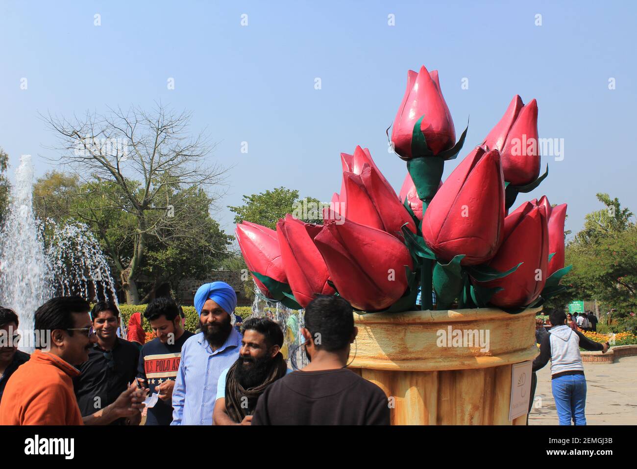 People near the artificial flowers in the Garden of Five Senses, New