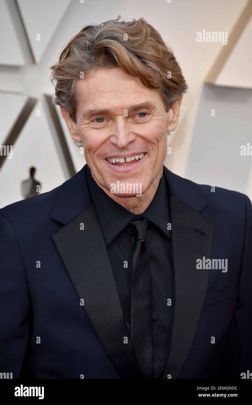 Willem Dafoe walking on the red carpet at the 91st Academy Awards