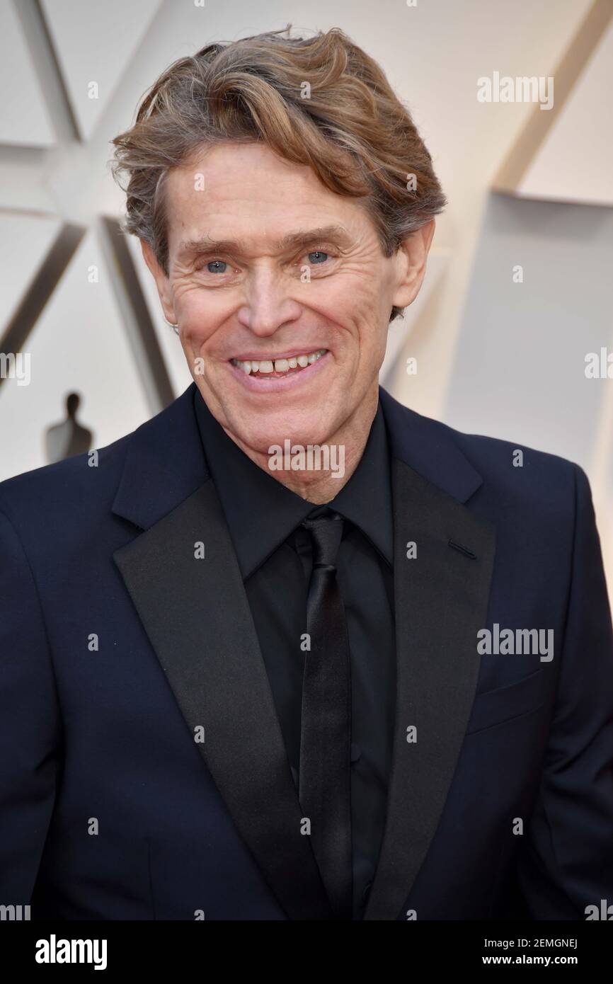 Willem Dafoe walking on the red carpet at the 91st Academy Awards