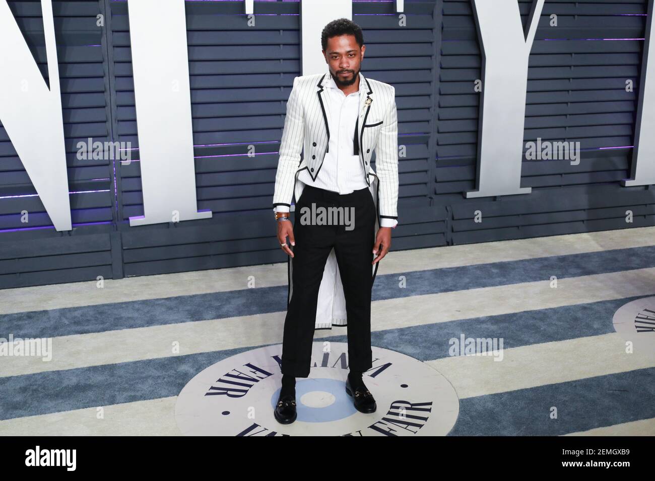 Lakeith Stanfield walking on the red carpet at the 2019 Vanity Fair Oscar Party held at the