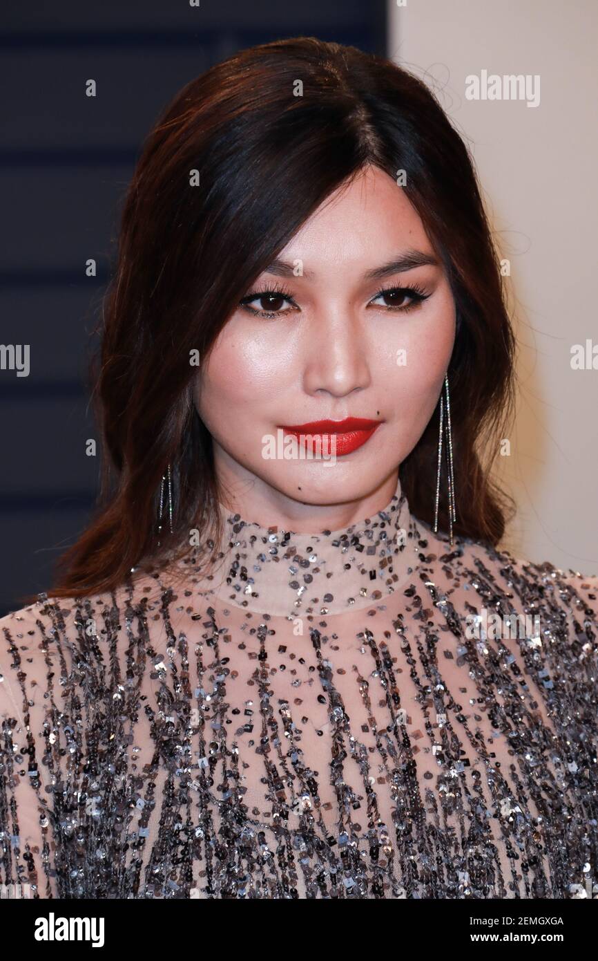 Gemma Chan walking on the red carpet at the 2019 Vanity Fair Oscar