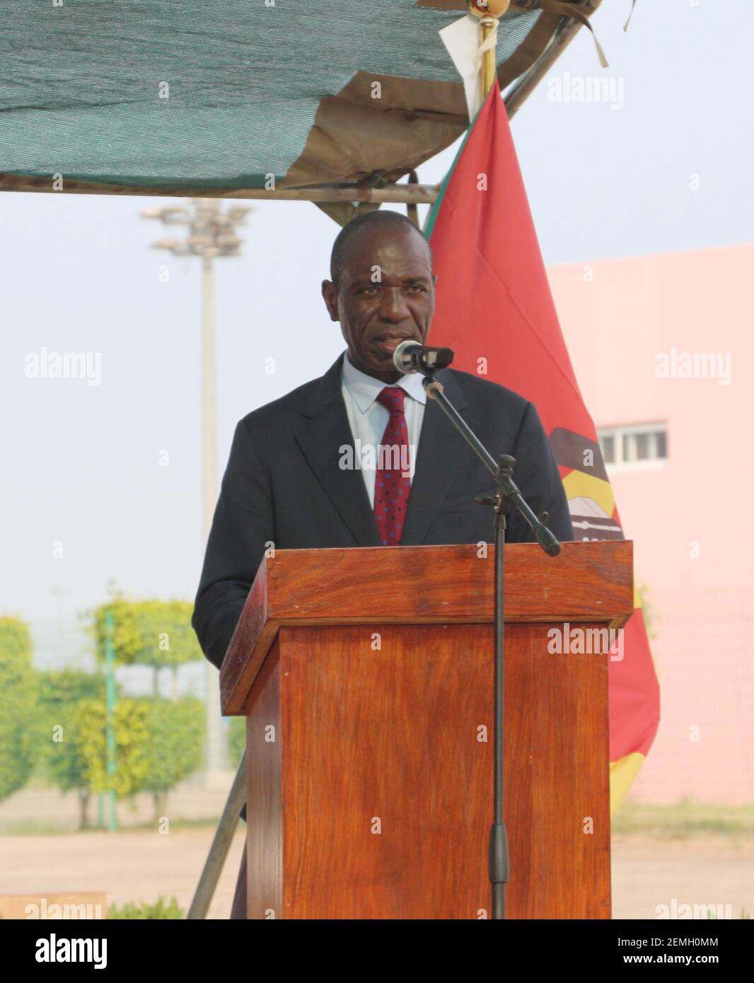 (210225) -- MAPUTO, Feb. 25, 2021 (Xinhua) -- Mozambican Prime Minister Carlos Agostinho do Rosario speaks at a delivery ceremony for the COVID-19 vaccines from China at the Maputo International Airport in Maputo, Mozambique, Feb. 24, 2021. A batch of COVID-19 vaccines donated by China arrived here on Wednesday to help the African country fight against the COVID-19 pandemic, and it was also the first batch of COVID-19 vaccines received by the country. (Photo by Ge Peiyao/Xinhua) Stock Photo