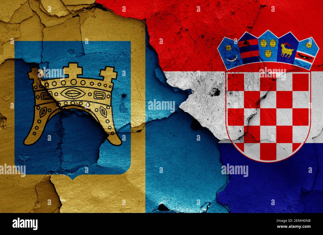 flags of Split-Dalmatia County and Croatia painted on cracked wall Stock Photo
