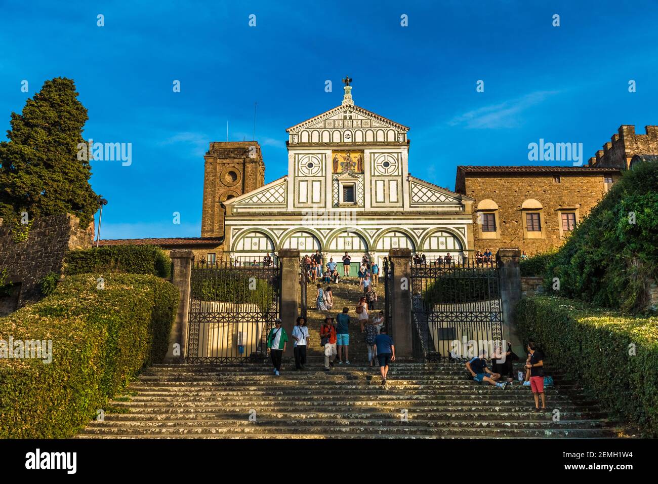 Beautiful view of the basilica San Miniato al Monte standing atop one of the highest points in Florence. To the right of the marble façade when... Stock Photo