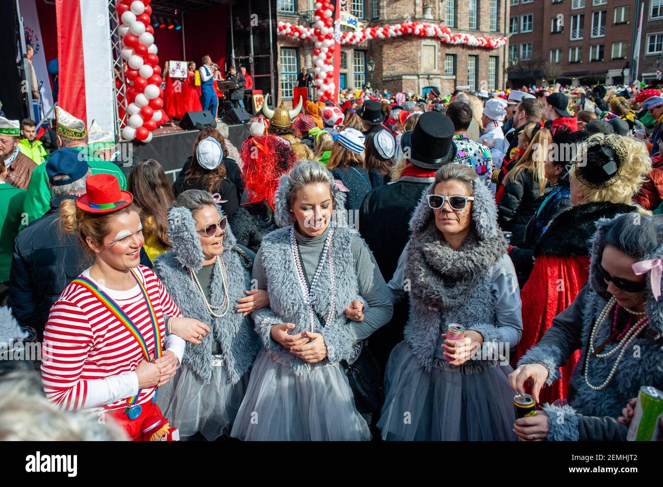 A group of women are dancing while wearing costumes during the celebration  of Women's Carnival Day in Dusseldorf on February 28th, 2019. On the first  day of the carnival or Altweiberfastnacht, the