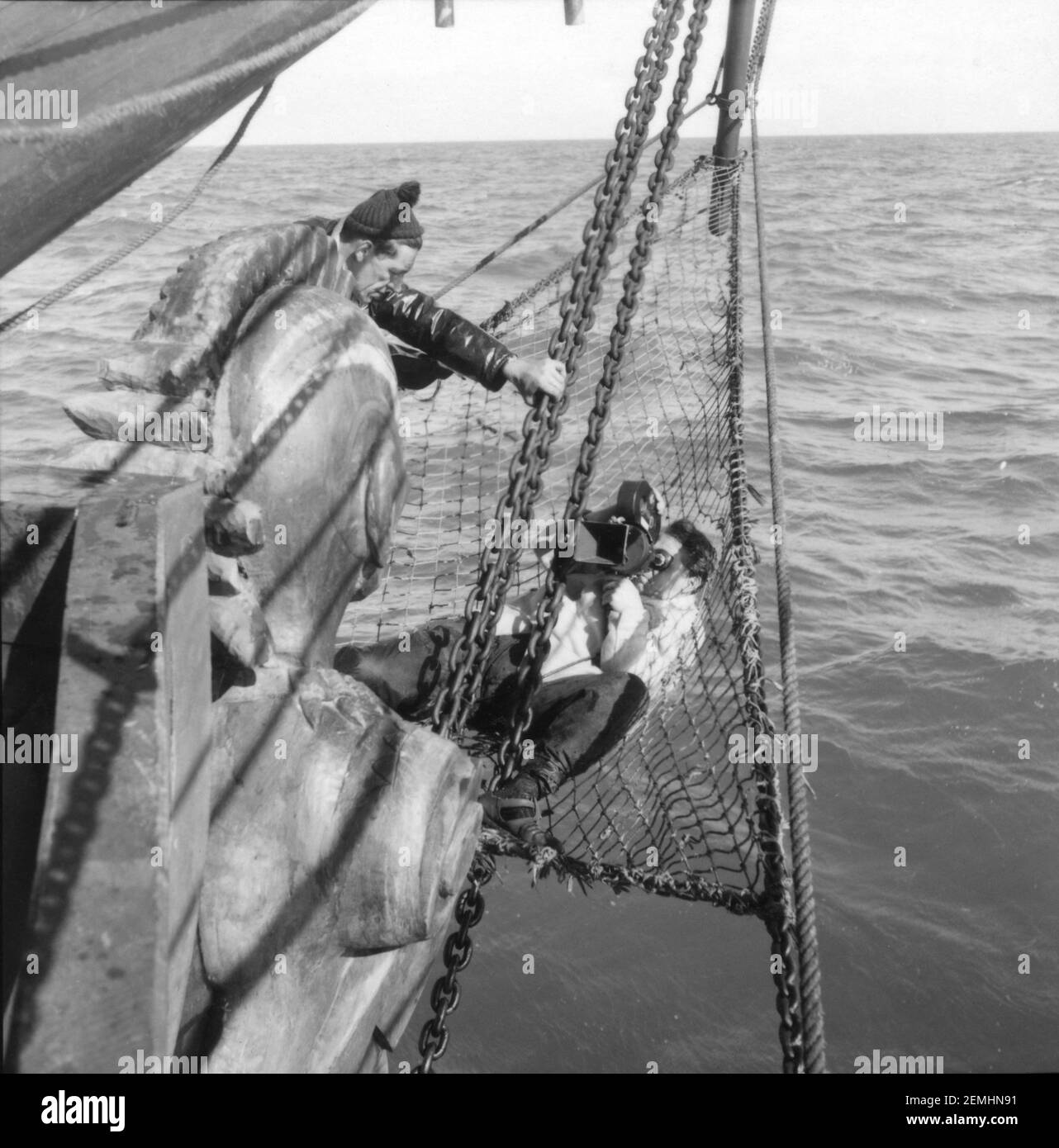 Cameraman filming the Prow of the whaling boat Pequod on set location ...