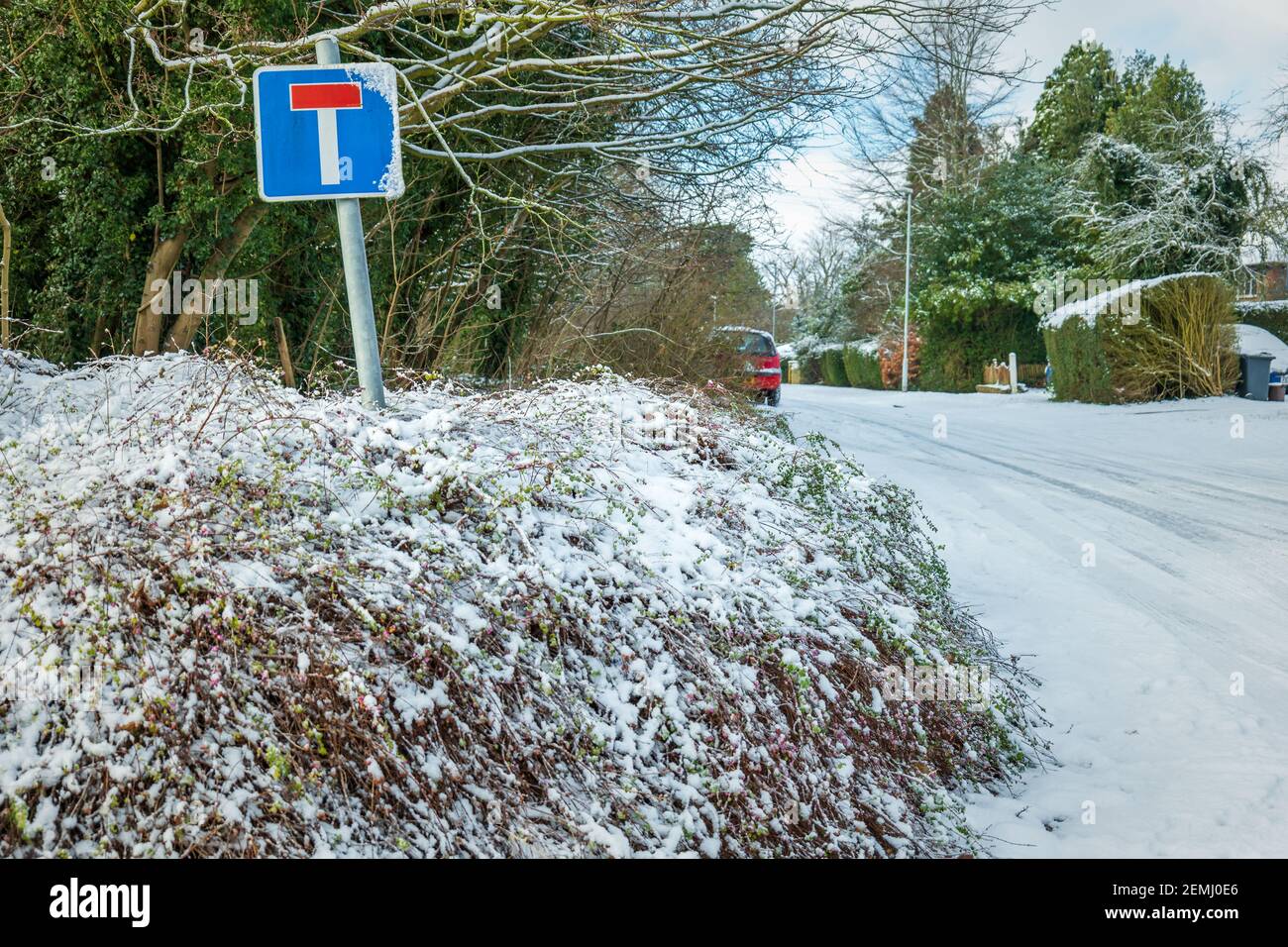 Cul-de-sac road sign under winter snow in england uk. Stock Photo
