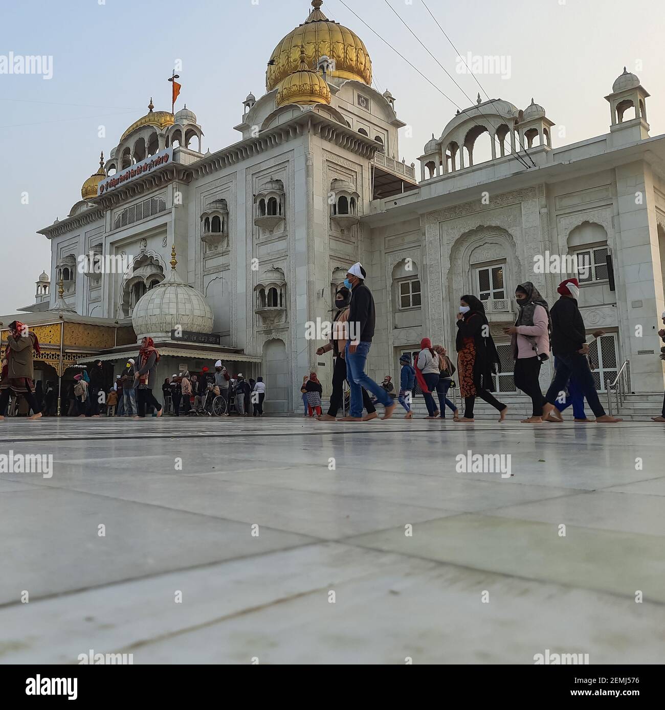 Gurdwara Bangla Sahib is the most prominent Sikh Gurudwara, Bangla Sahib Gurudwara in New Delhi, India inside view during evening time Stock Photo