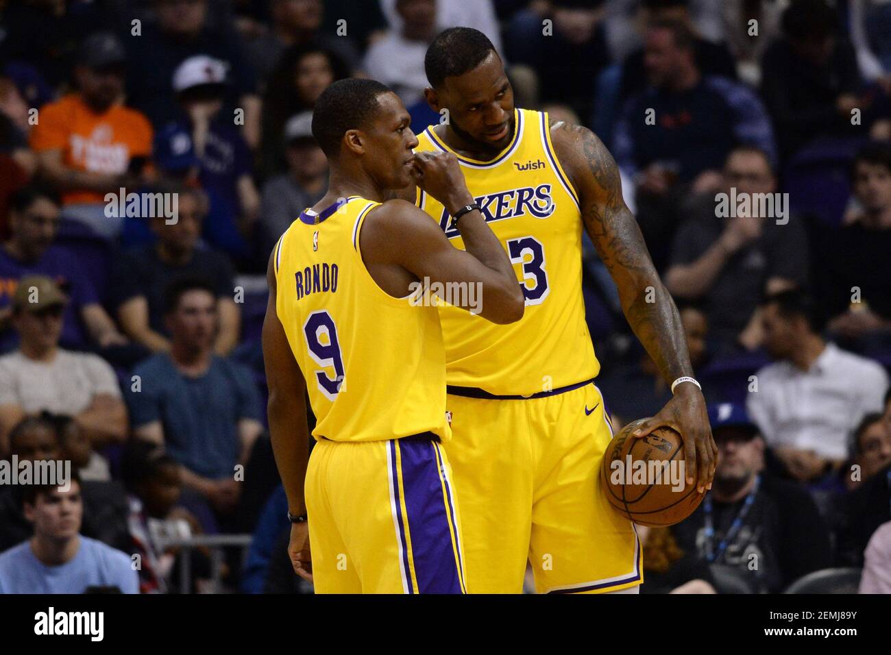 Mar 2, 2019; Los Angeles Lakers guard Rajon Rondo (9) and Los Angeles  Lakers forward LeBron James (23) against the Phoenix Suns during the NBA  game at Talking Stick Resort Arena in