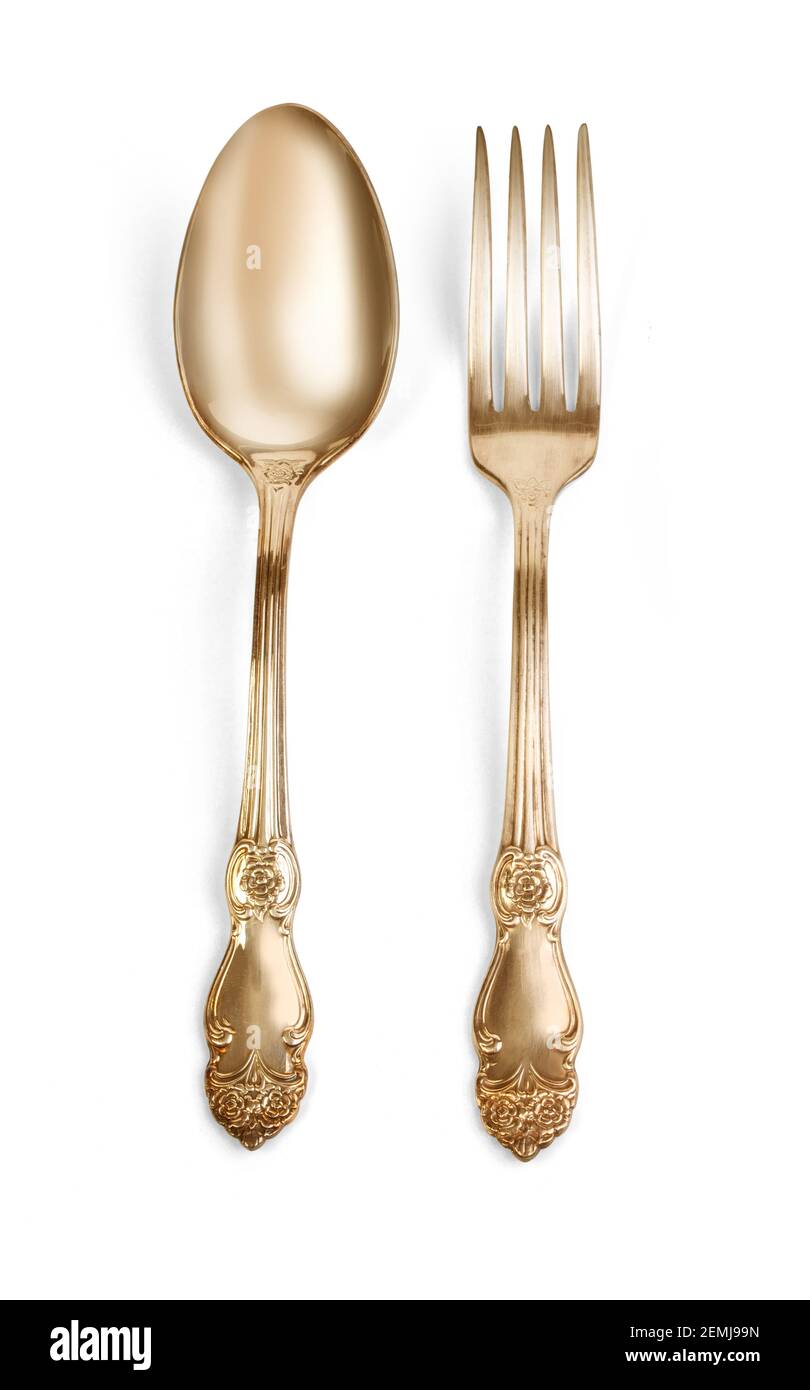 Golden spoon and fork isolated with clipping path Stock Photo Alamy