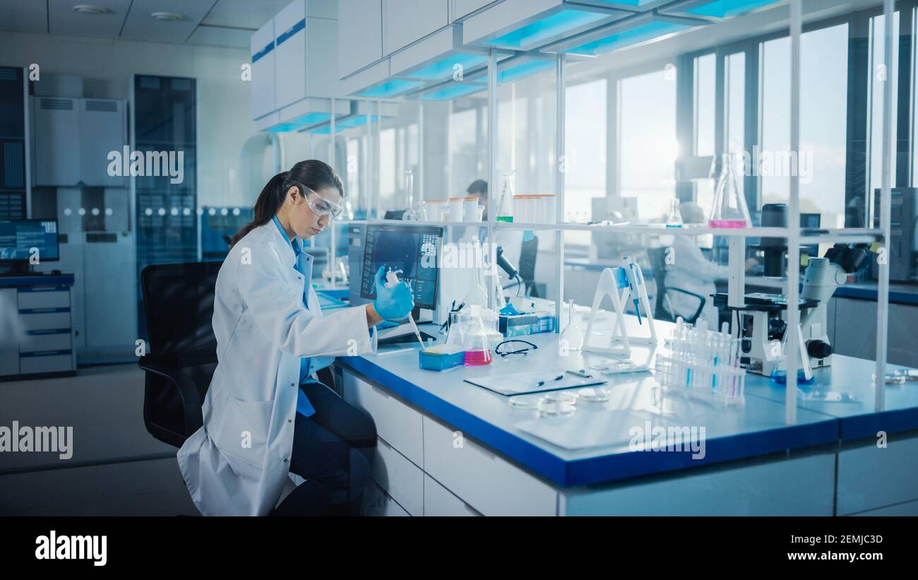 Modern Medical Research Laboratory Team of Scientists Working with