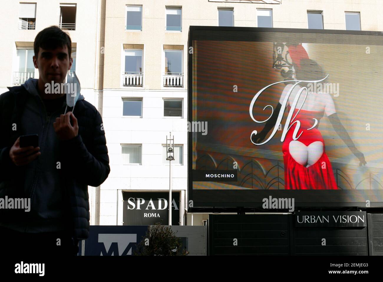 Dita Von Teese is seen at the end of the Moschino Fall/Winter 2021/2022  digital show streamed on a giant screen set up in San Babila square during  Fashion Week in Milan, Italy,