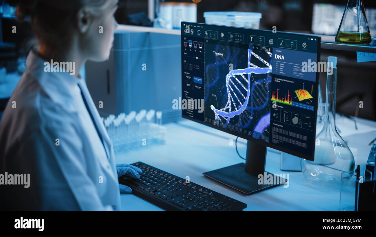 Medical Research Laboratory: Portrait of Female Scientist Working on Computer, Analysing DNA, Virus. Advanced Scientific Lab for Medicine Stock Photo