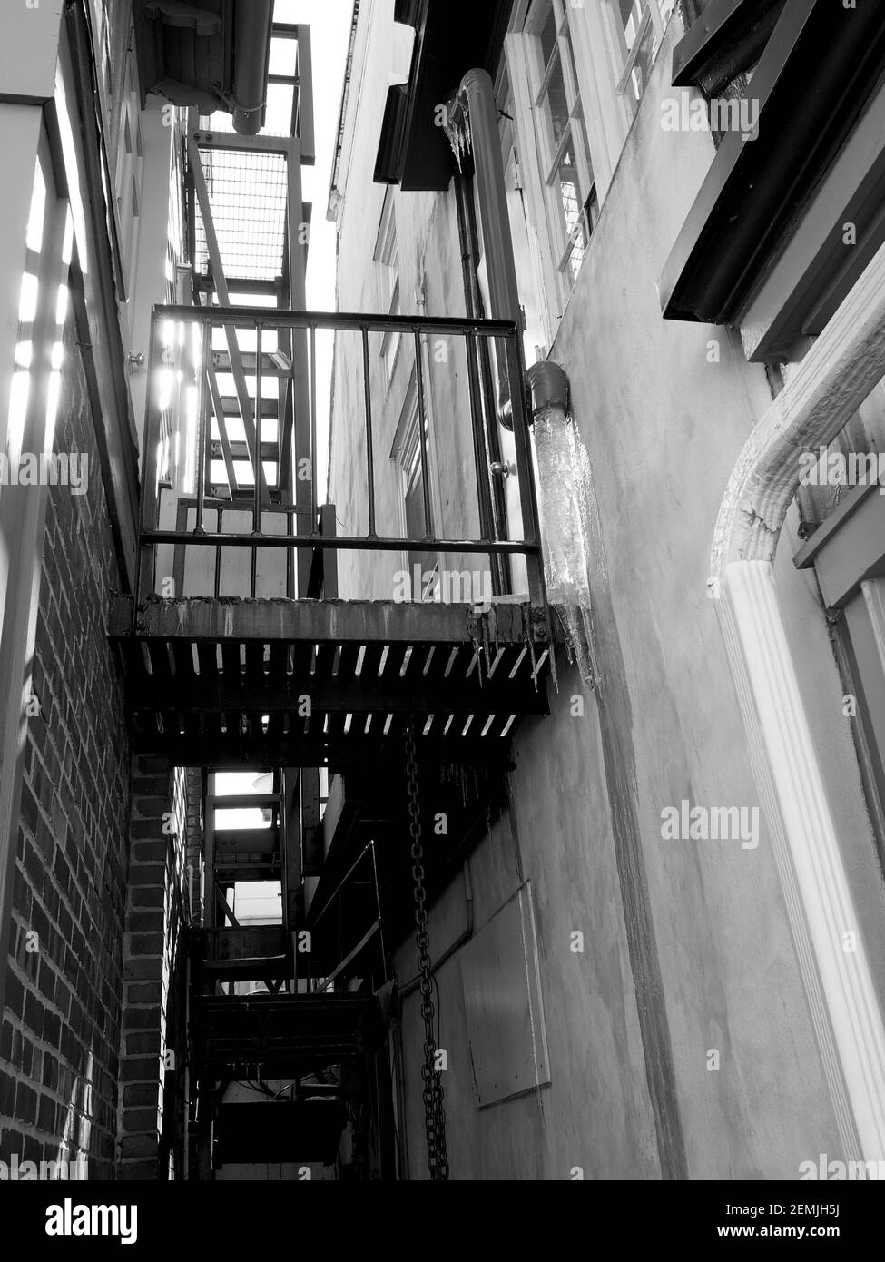 In the back alley with an old fire escape Stock Photo Alamy