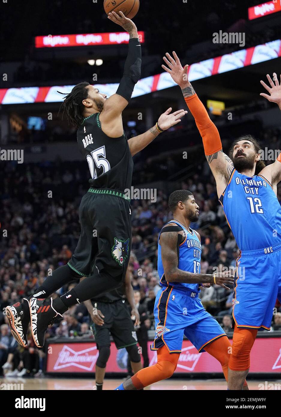 The Minnesota Timberwolves Derrick Rose 25 shoots as the Oklahoma City Thunder s Steven Adams 12 defends during the first half at Target Center in Minneapolis on Tuesday March 5 2019. Photo by