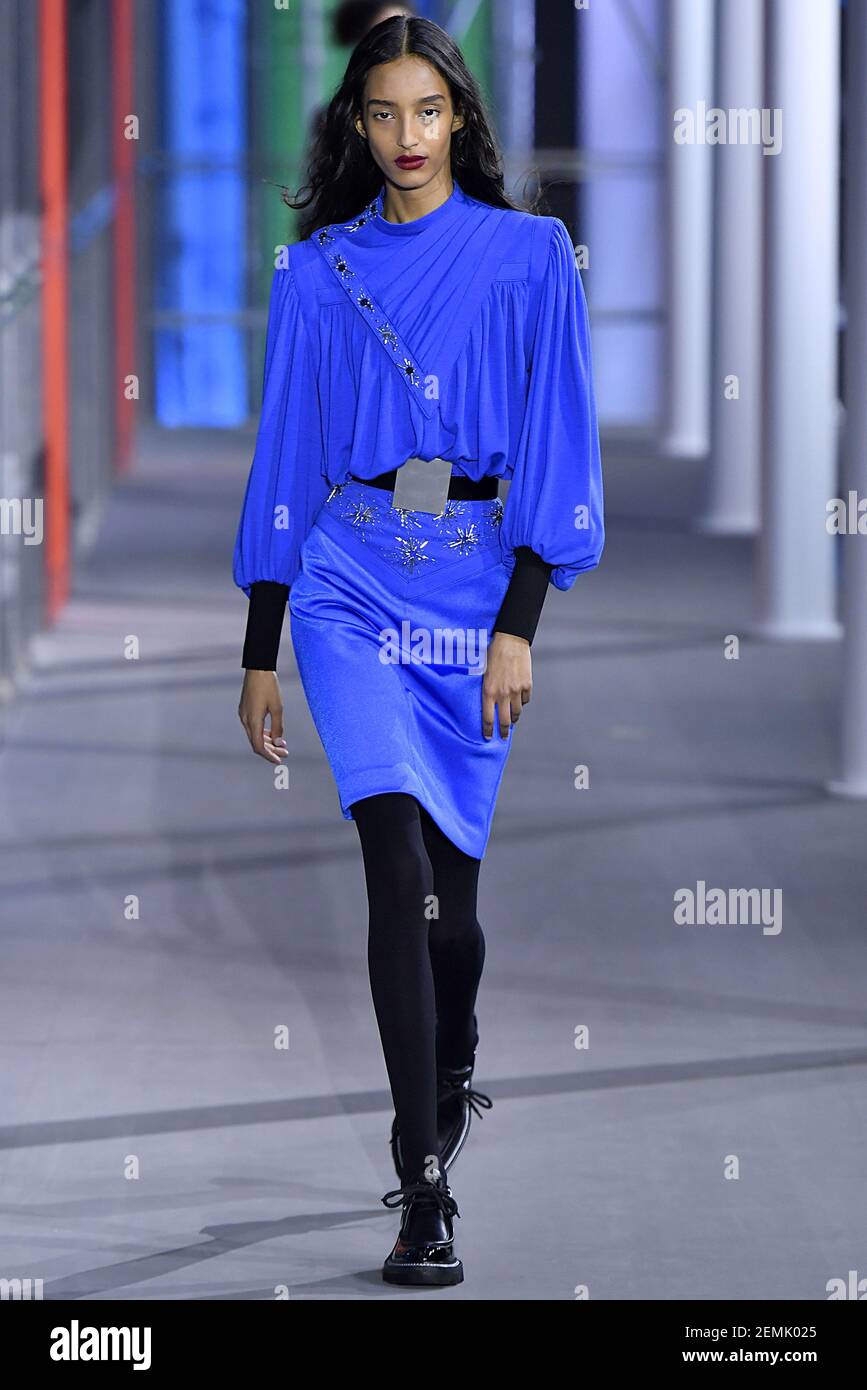 Mona Tougaard walks on the runway during the Louis Vuitton Resort