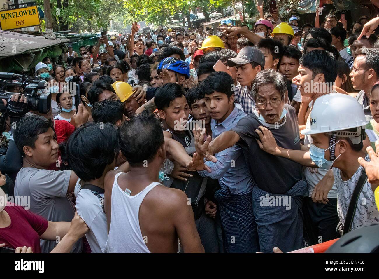 Residents arrest military supporters during the rally. Myanmar's military detained State Counsellor of Myanmar Aung San Suu Kyi and declared a state of emergency while seizing the power in the country for a year after losing the election against the National League for Democracy (NLD). (Photo by Santosh Krl / SOPA Images/Sipa USA) Stock Photo