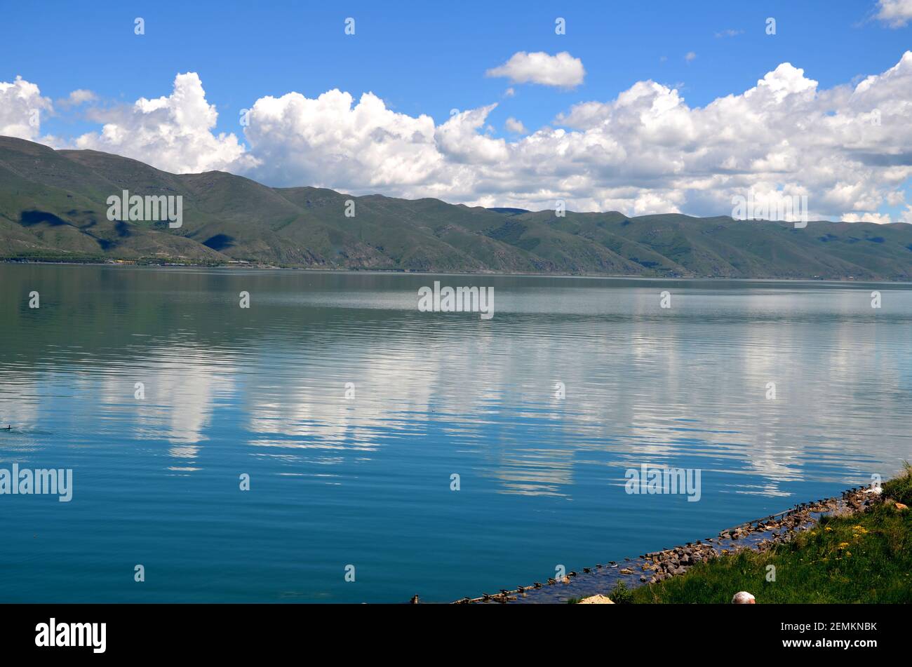clouds and mountain reflection at Lake Sevan, Armenia Stock Photo - Alamy