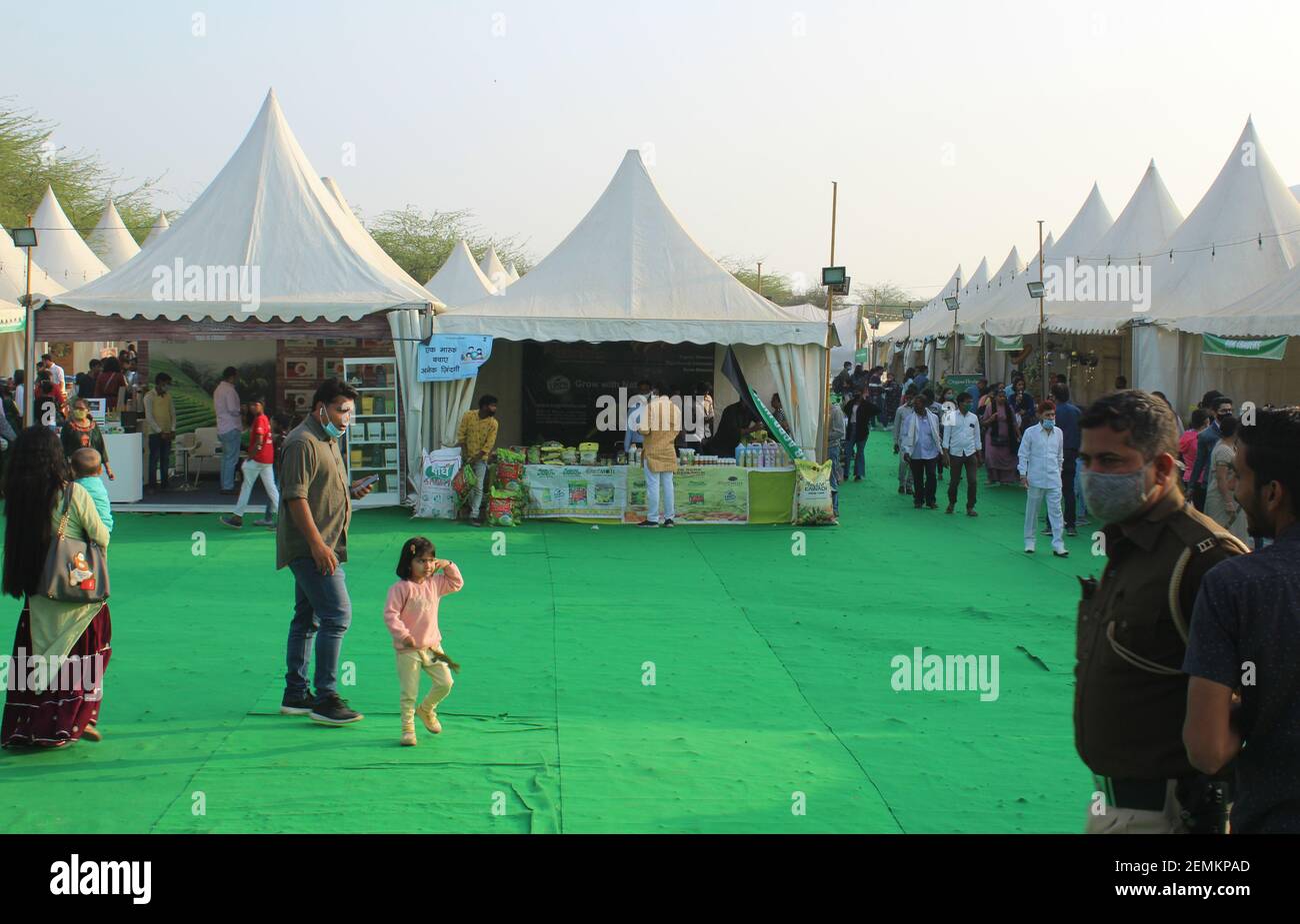 People shopping at the stalls selling seeds, plants and gardening items  etc. at the 34th Garden Tourism Festival in the Garden of Five Senses Stock Photo