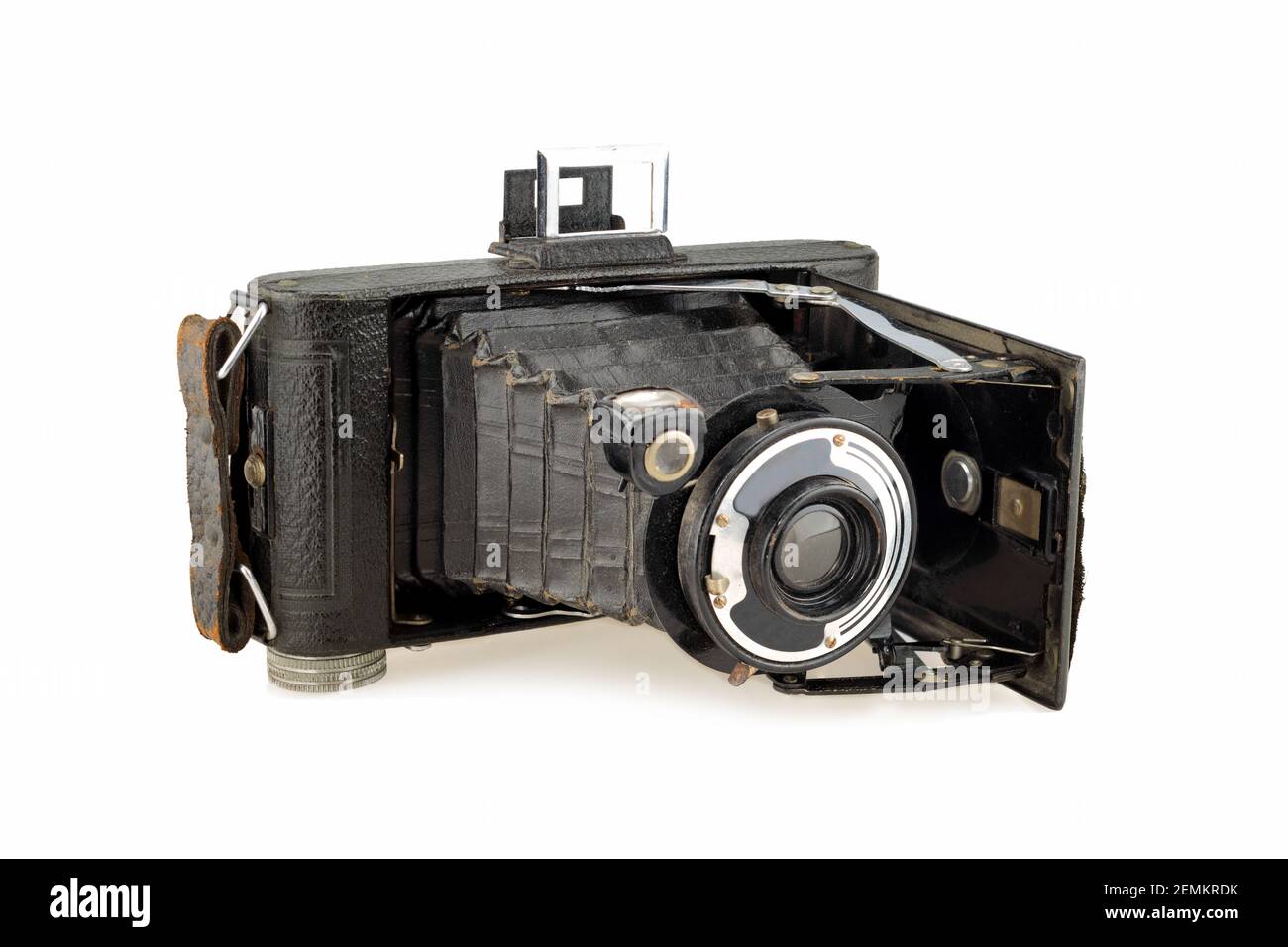 ancient folding camera on white background Stock Photo