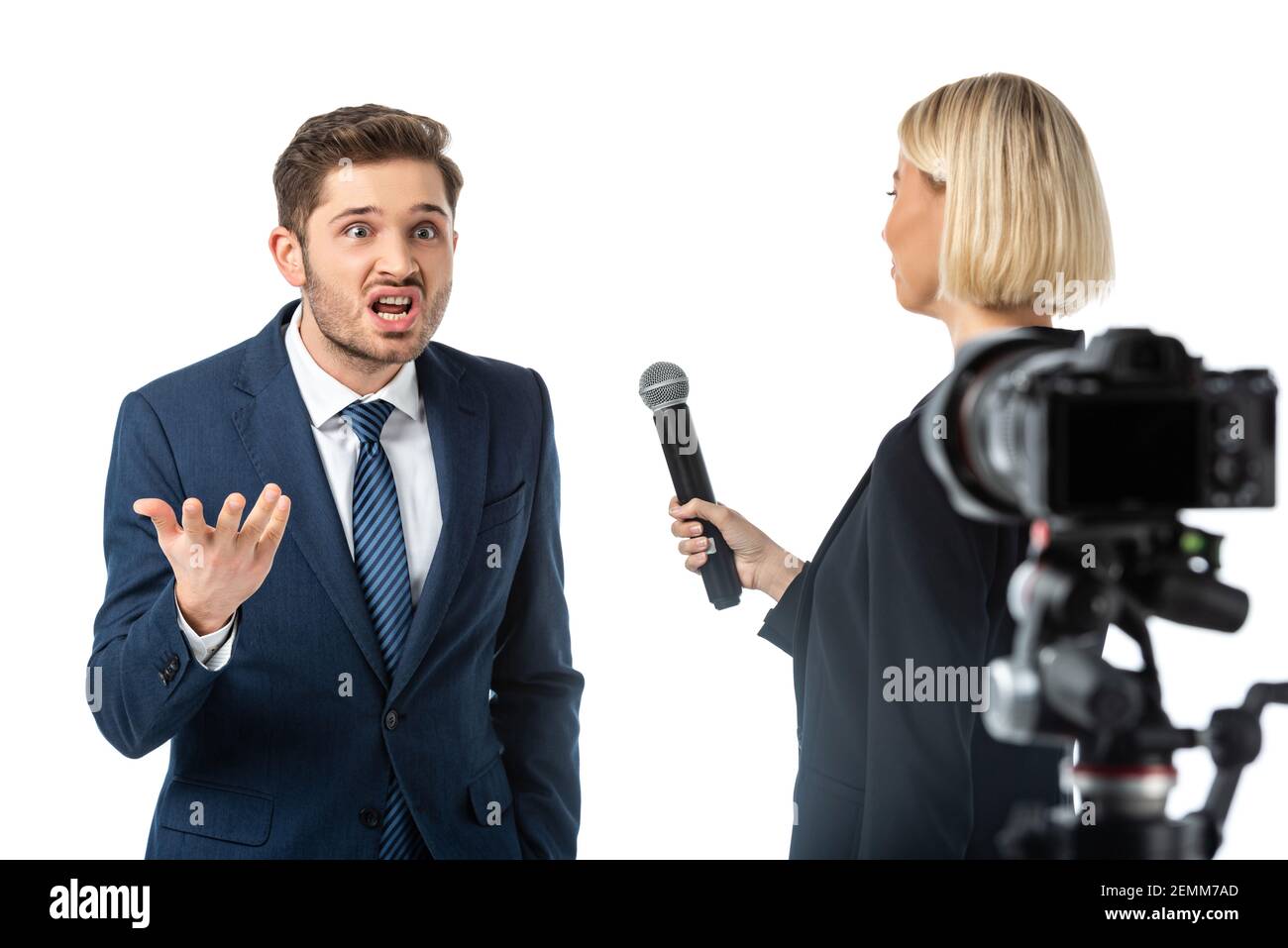 blonde journalist interviewing angry businessman near digital camera on blurred foreground isolated on white Stock Photo
