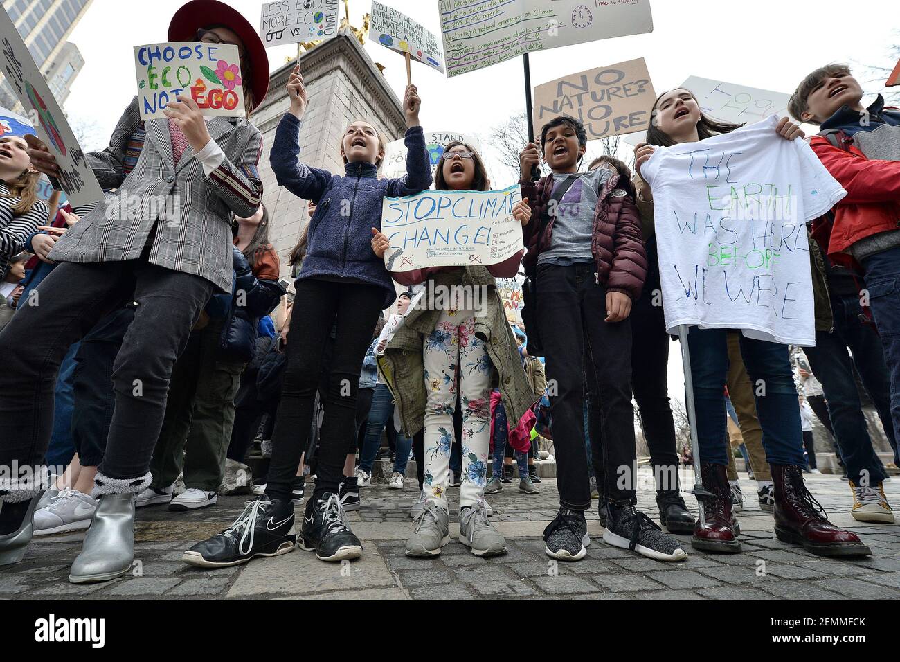Students participate in the U.S. Youth Climate Strike at Columbus Circle in New York, NY, March 15, 2019. Thousands of students around the world skipped school Friday to protest lack of action on climate change. (Photo by Anthony Behar/Sipa USA) Stock Photo