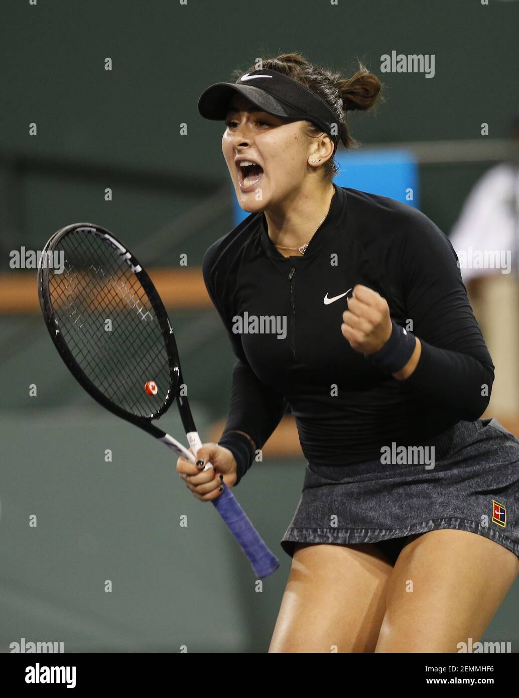 Bianca Andreescu (CAN) celebrates after winning a point against Elina  Svitolina (UKR) during her semifinals match at the 2019 BNP Paribas Open at  Indian Wells Tennis Garden in Indian Wells, California. Charles