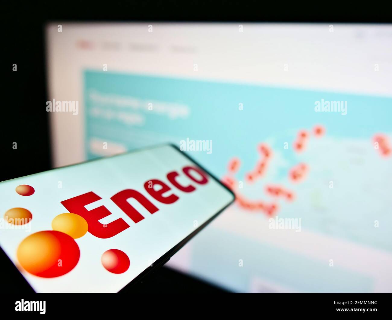 Mobile Phone With Business Logo Of Dutch Utility Company Eneco Groep Nv On Screen In Front Of Website Focus On Center Left Of Phone Display Stock Photo Alamy