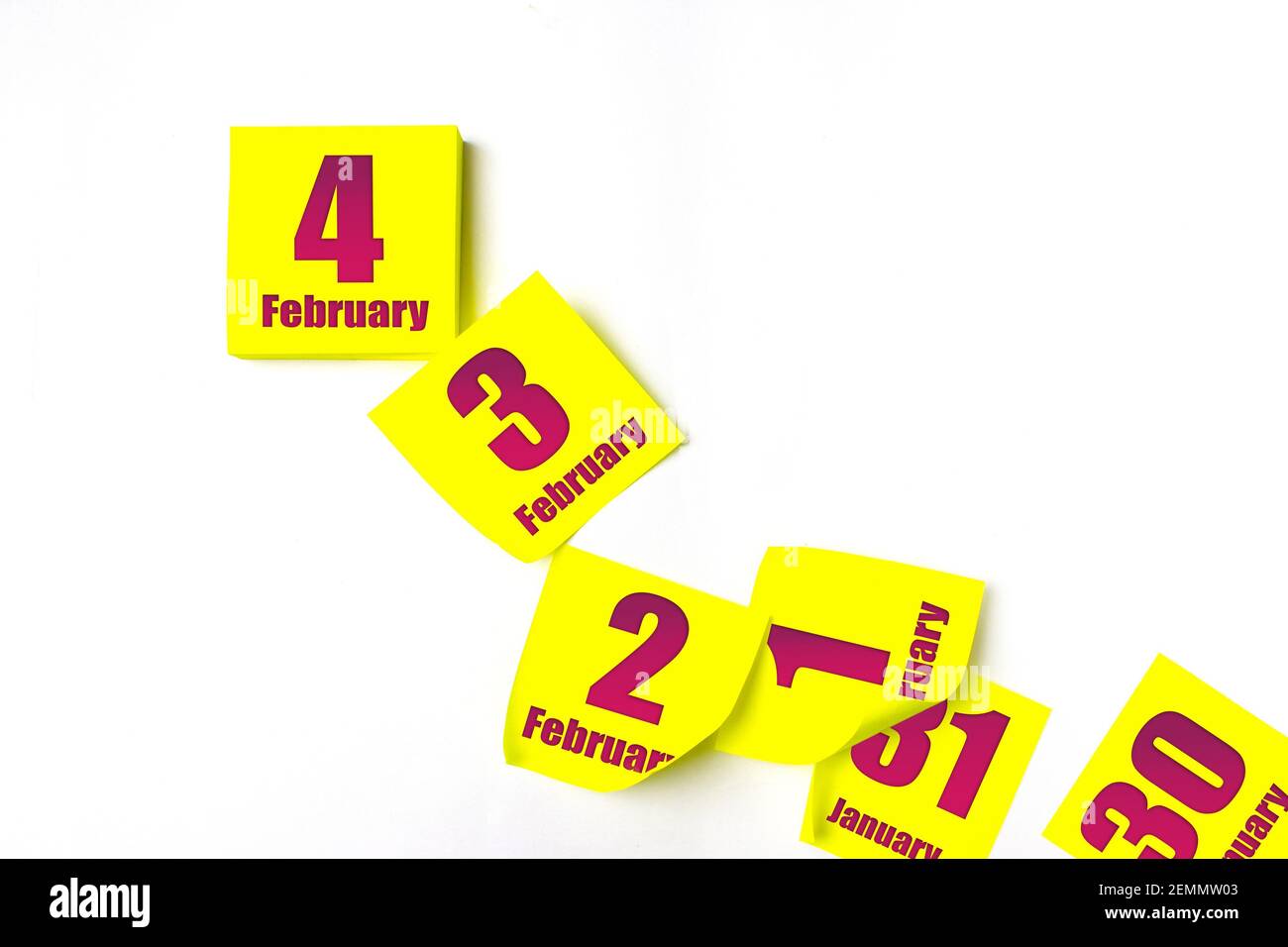 Yellow Febuary February 4th. Day 4 of month, Calendar date. Many yellow sheet of the ...