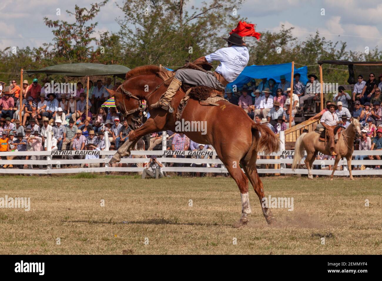 A Gaucho (Cowboy) seen riding a horse during the