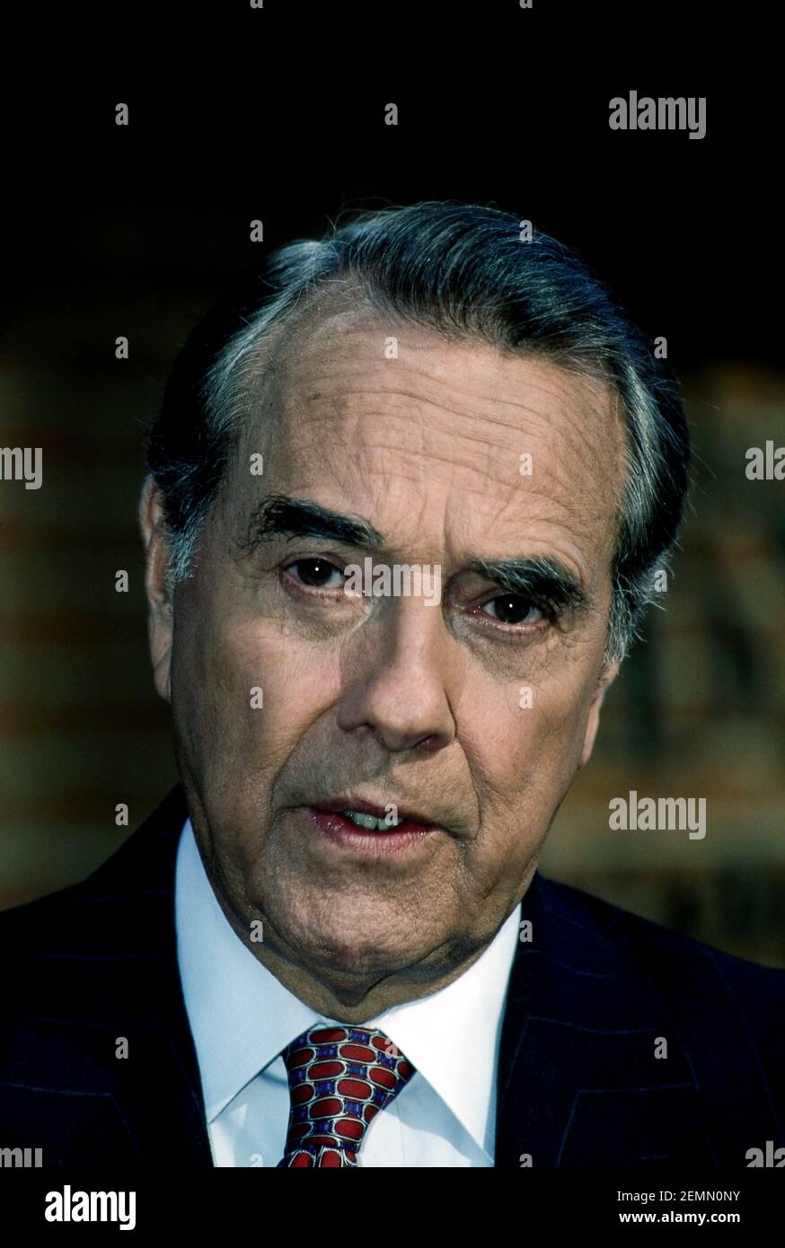 Republican Senator Robert Dole of Kansas speaks with reporters outside the CBS studios after his appearance on the Sunday morning talk show "Face The Nation" Washington DC., March 5, 1995. Credit: Mark Reinstein/MediaPunch Stock Photo