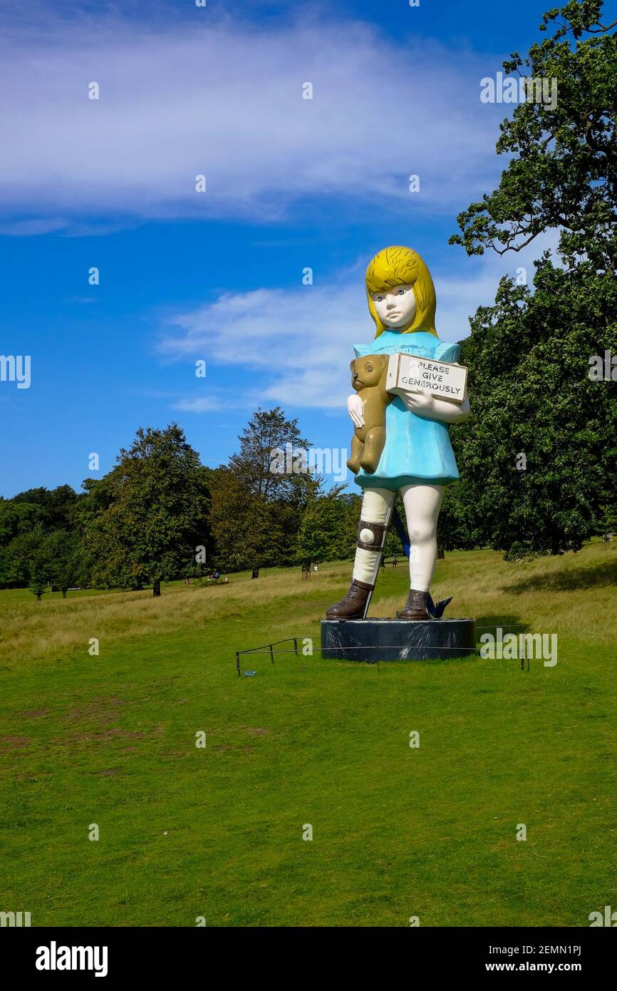 Charity, by Damien Hurst, a painted bronze sculpture on display at the Yorkshire Sculpture Park (YSP) Stock Photo