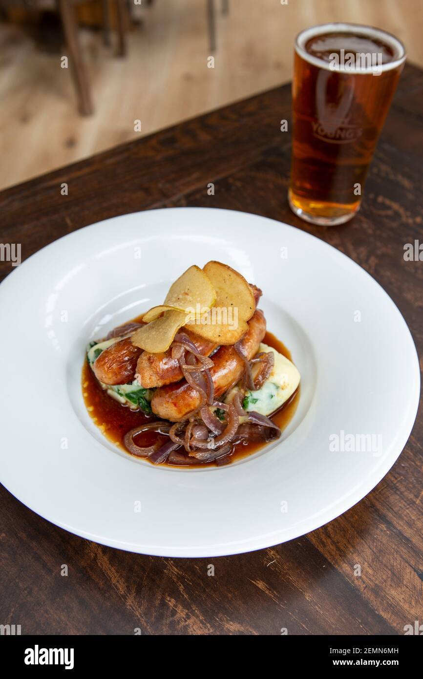 Sausage and mash with a pint of beer Stock Photo