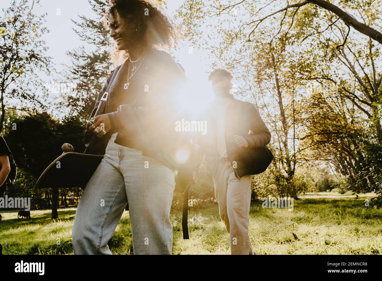 Woman walking in a park hi-res stock photography and images - Alamy