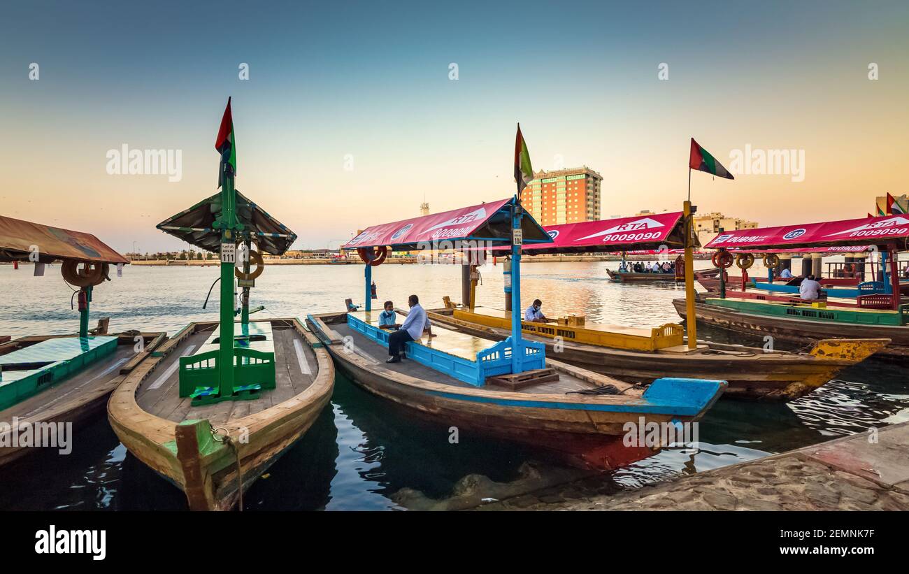 Dubai, UAE, 3 January 2021: View of Dubai Creek. Boats and Abra ferries on the Bay of Creek in Dubai. Famous tourist destination in the UAE Stock Photo