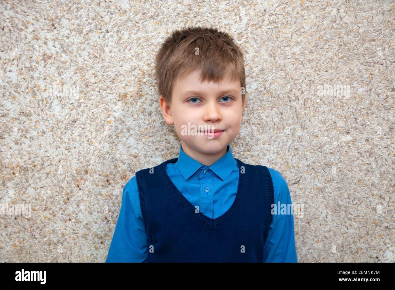 Boy student in school uniform smiling. Stock Photo