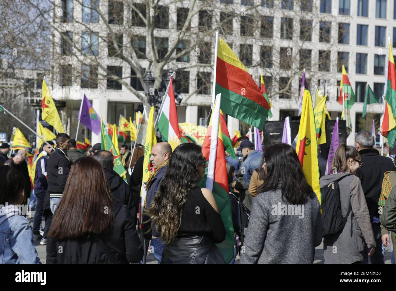 (3/23/2019) Protesters wave flags of Rojava (Syrian Kurdistan) and YPG ...