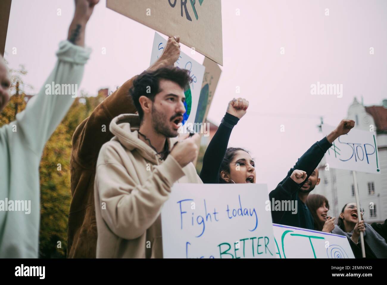 Male and female activist screaming in social movement Stock Photo