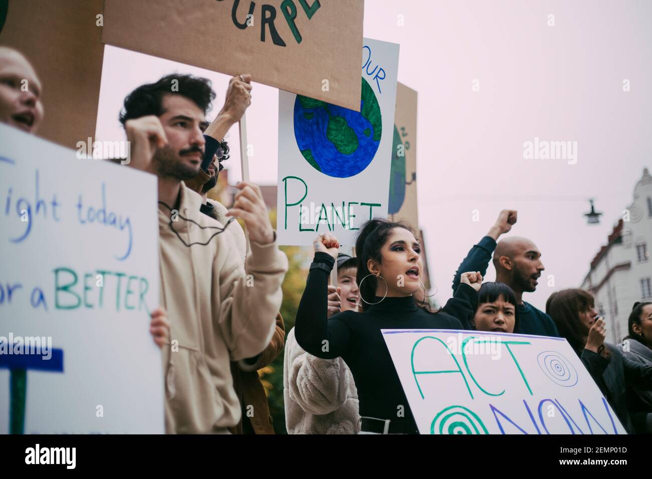 Male and female protestors screaming in social movement Stock Photo