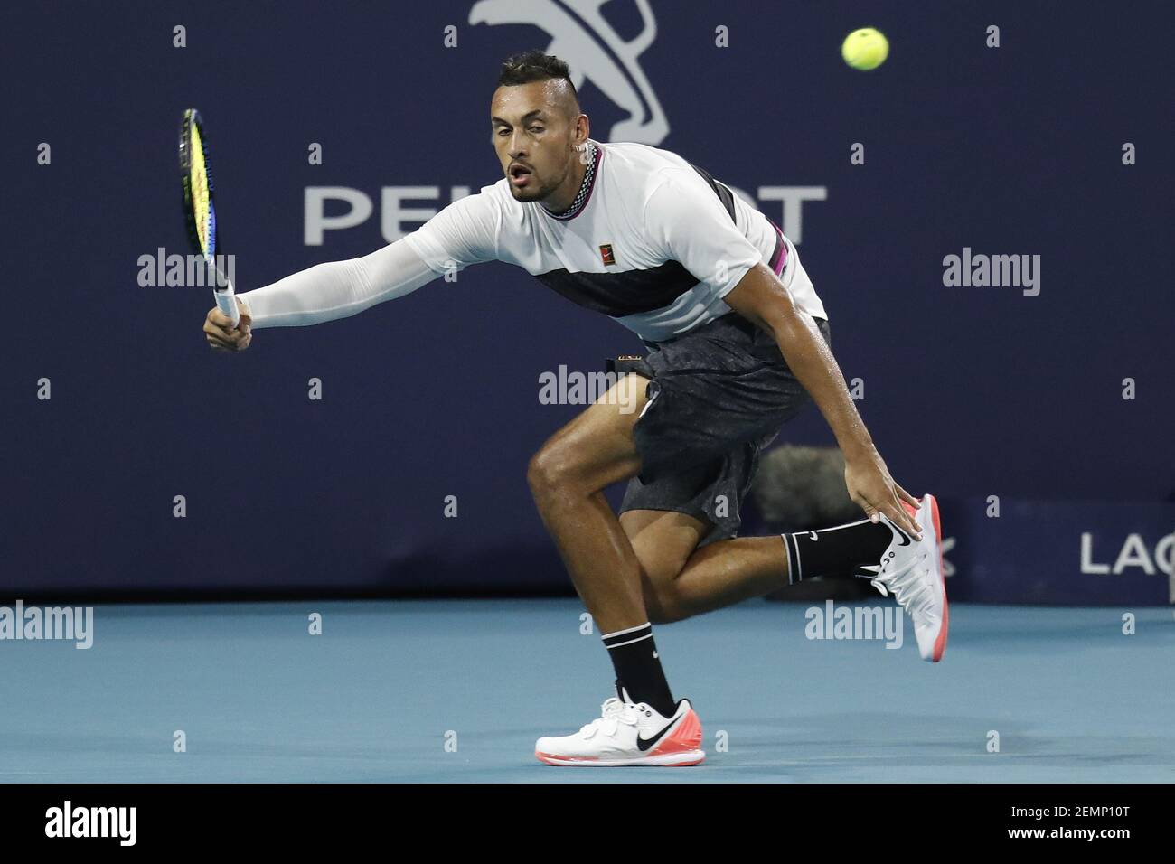 Mar 24, 2019; Miami Gardens, FL, USA; Nick Kyrgios of Australia reaches for  a forehand against Dusan Lajovic of Serbia (not pictured) in the third  round of the Miami Open at Miami