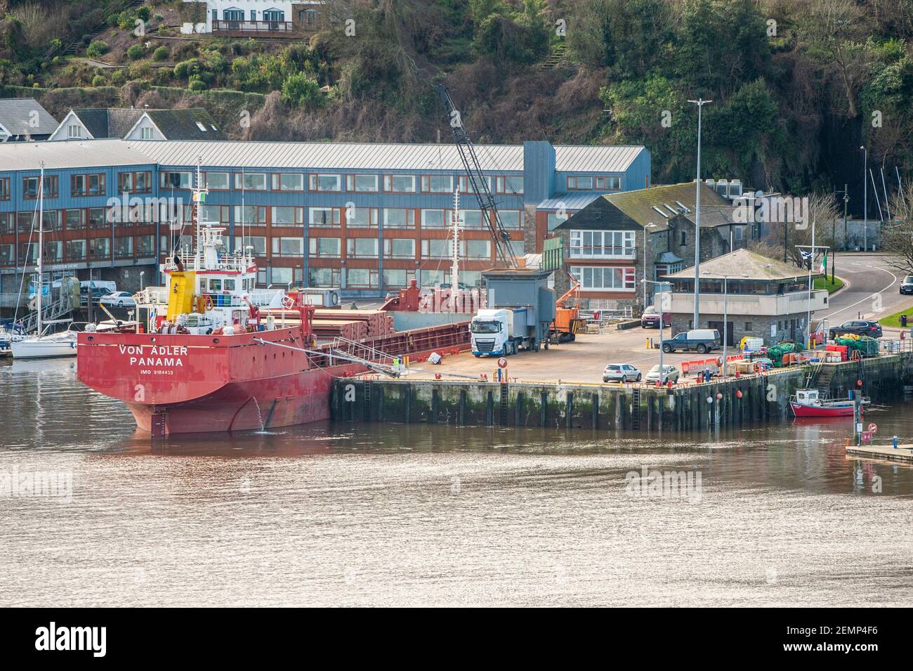 Kinsale, West Cork, Ireland. 25th Feb, 2021. The sun shone on Kinsale today, two days after 80mm of rain fell in the region. Bulk carrier 'Von Adler' unloaded her cargo at Kinsale Port. Credit: AG News/Alamy Live News Stock Photo